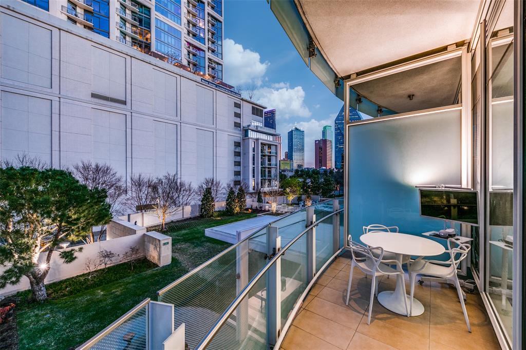 1918 Olive Street, Unit 202 Dallas, TX 75201 - Photo 23 of 36 a view of a patio in backyard