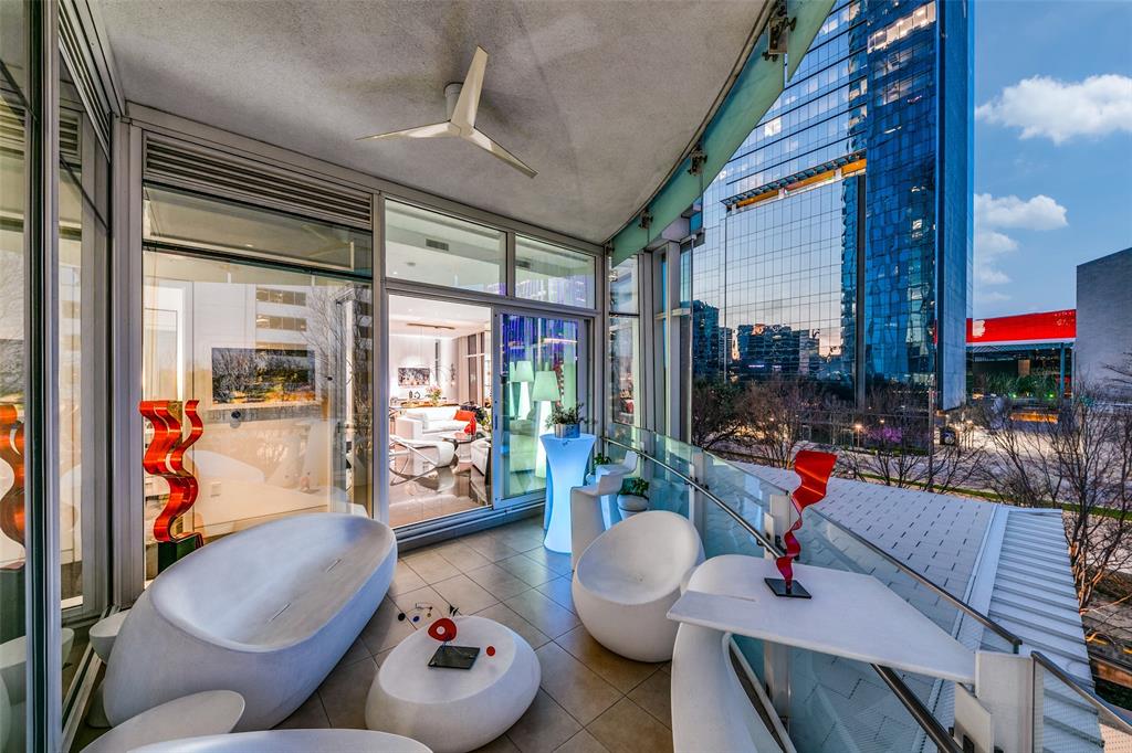 1918 Olive Street, Unit 202 Dallas, TX 75201 - Photo 24 of 36 a living room with furniture and a window