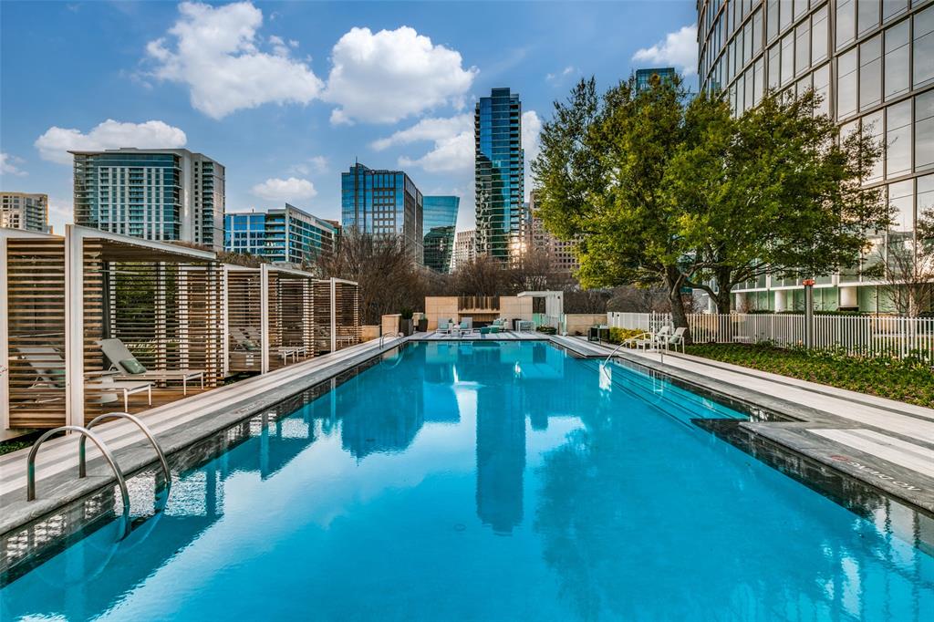1918 Olive Street, Unit 202 Dallas, TX 75201 - Photo 30 of 36 a view of a swimming pool with a fountain