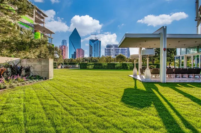 a view of a house with a yard and plants