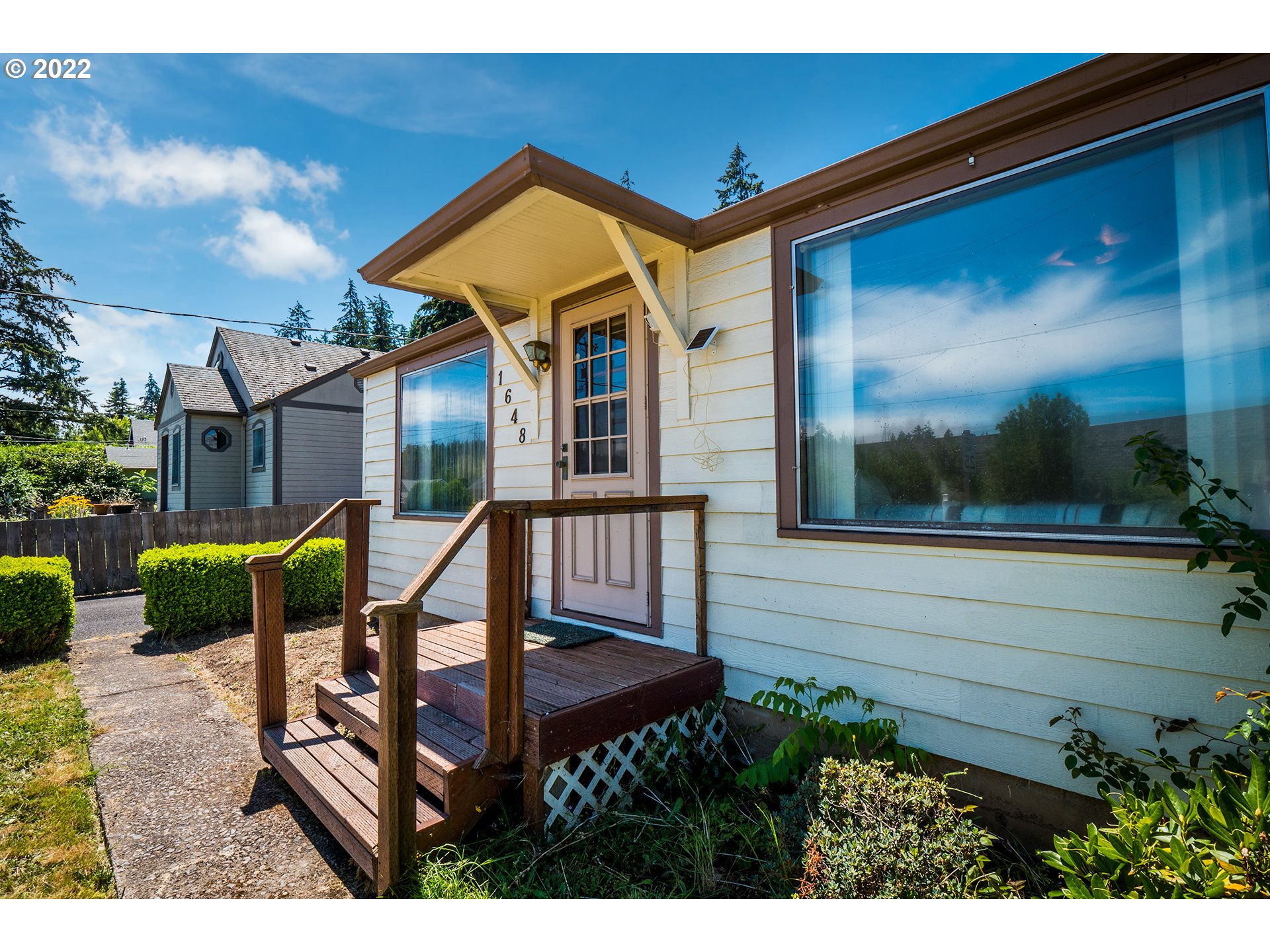 1648 Augusta Street Eugene, OR 97403 - Photo 16 of 29 a view of a chair and tables in the balcony