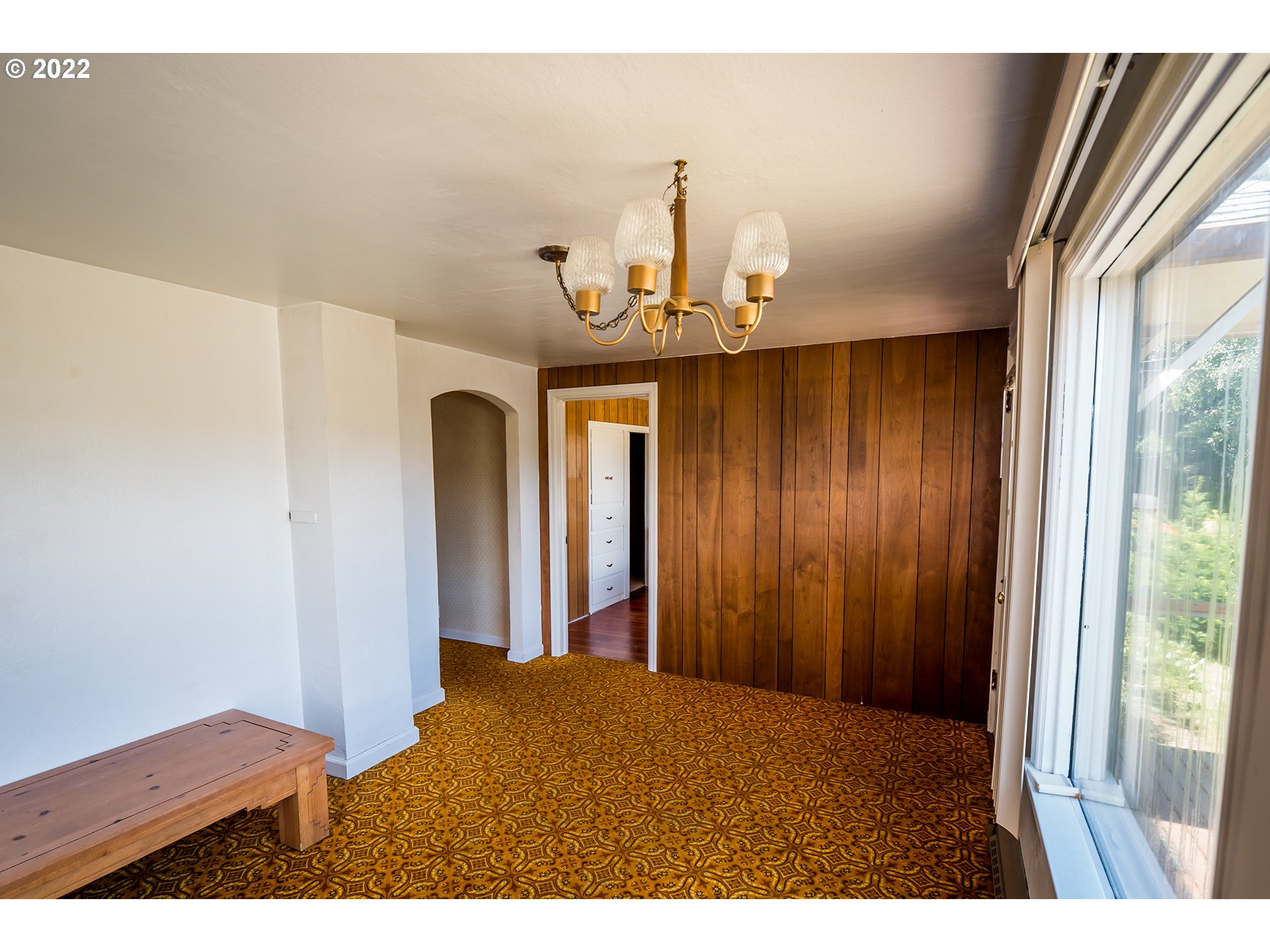 1648 Augusta Street Eugene, OR 97403 - Photo 3 of 29 a view of a hallway with a chandelier