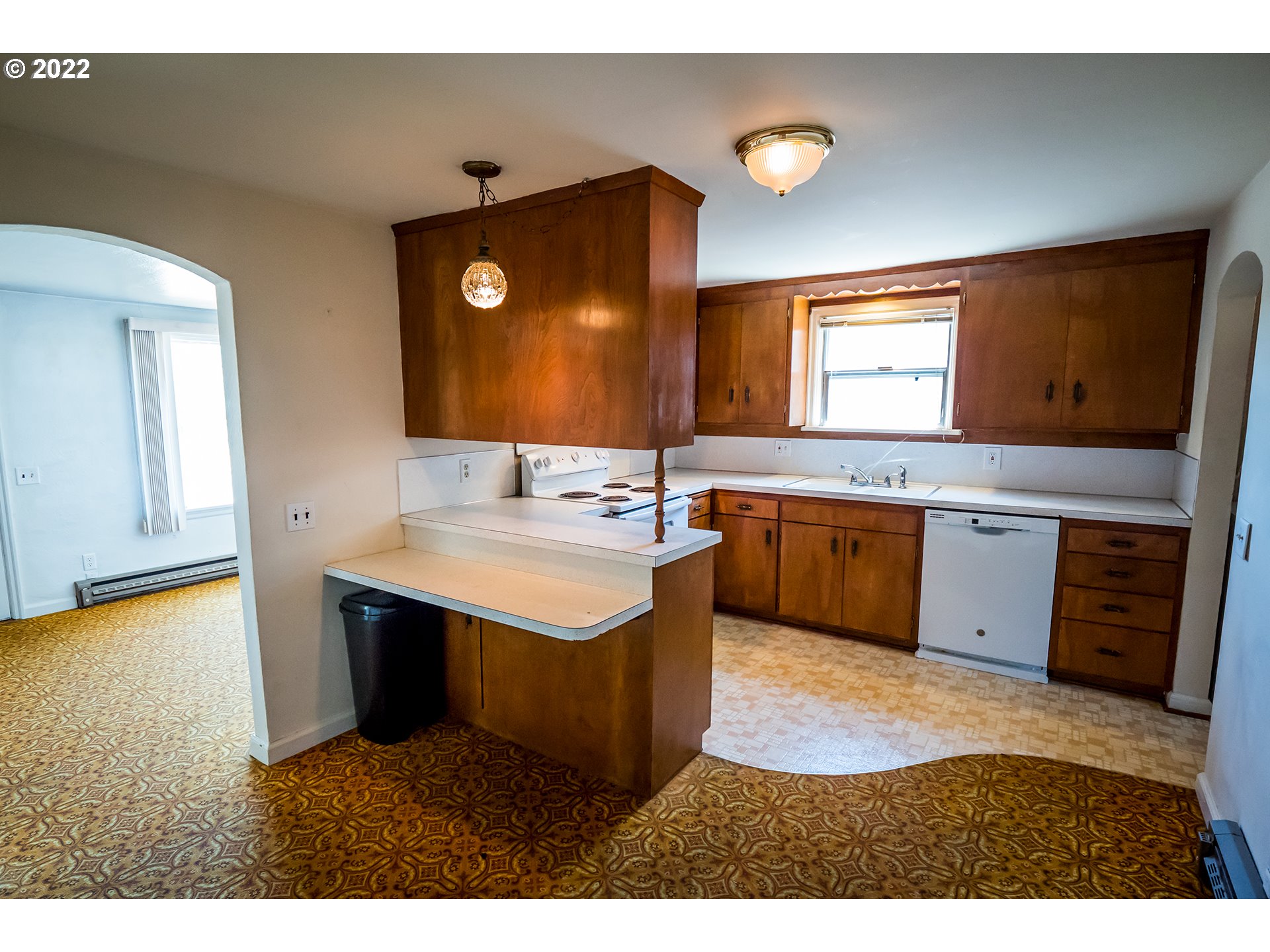 1648 Augusta Street Eugene, OR 97403 - Photo 5 of 29 a bathroom with a sink vanity and a mirror