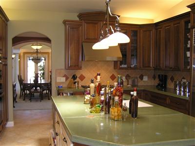 Custom concrete counter tops grace this elegant yet functional kitchen...double Miele oven's, 2 dishwashers, Wolfe range and Sub Zero fridge are there to aid the gourmet chef...or bring one out that may be hidden in you!