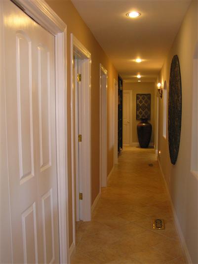 219 Riviera Drive San Rafael, CA 94901 - Photo 9 of 10 If ever a hallway felt like a walk through a museum this one does...it is an elegant and delightful path to bedrooms and bathrooms...