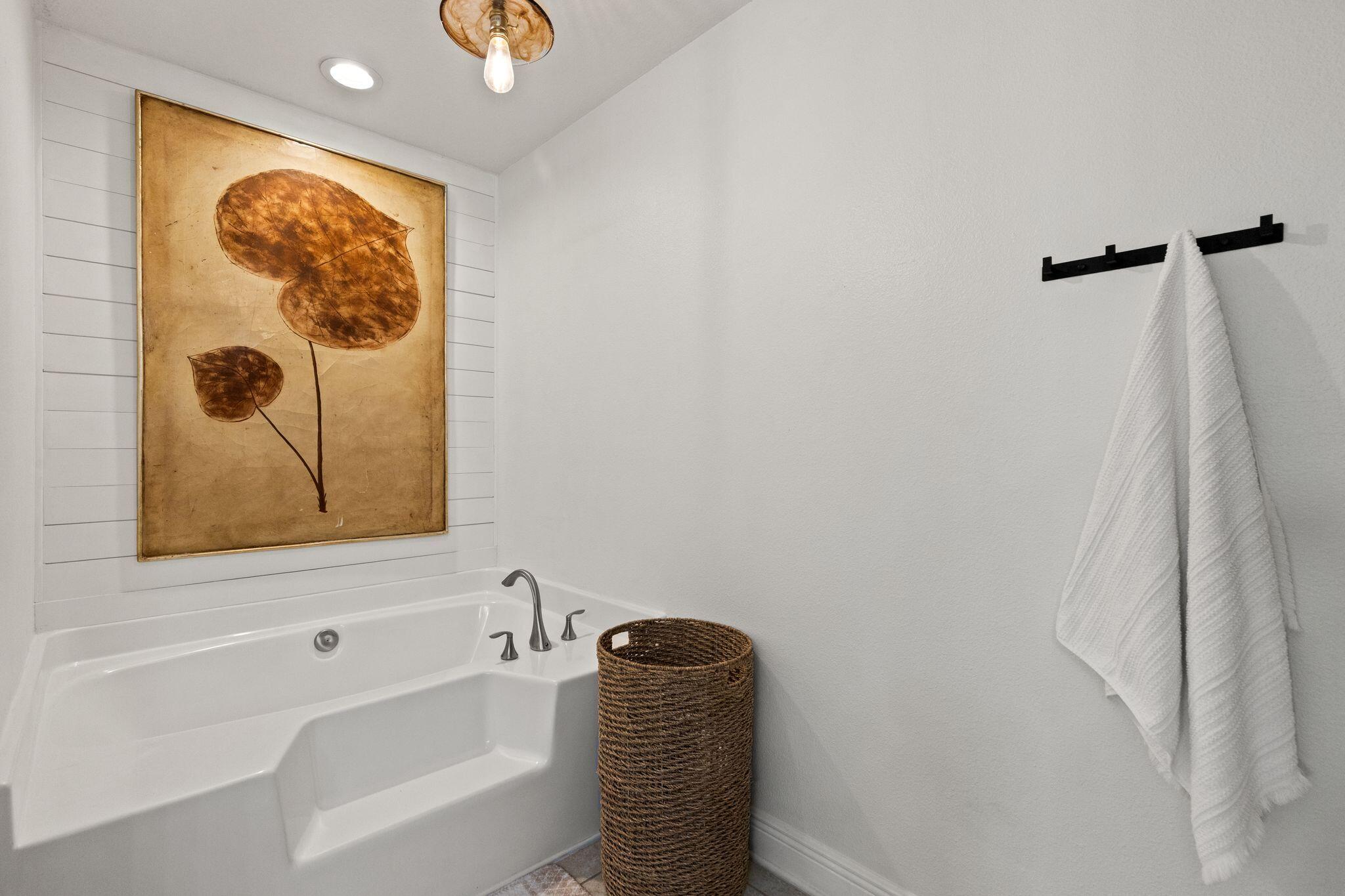 10 Golden Eagle Court Santa Rosa Beach, FL 32459 - Photo 20 of 36 a bathroom with a bathtub and a shower