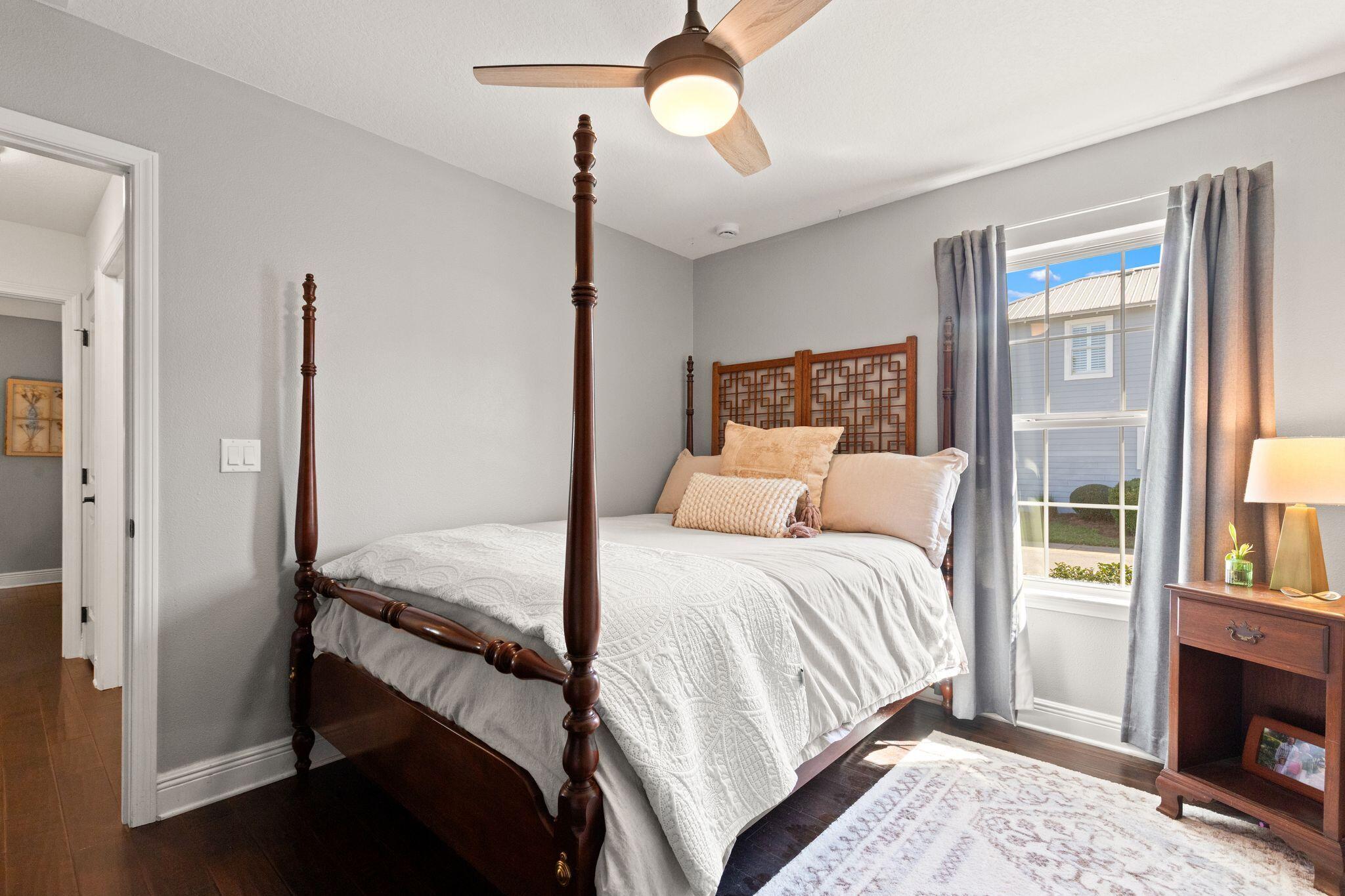 10 Golden Eagle Court Santa Rosa Beach, FL 32459 - Photo 23 of 36 a bedroom with a bed and a fireplace
