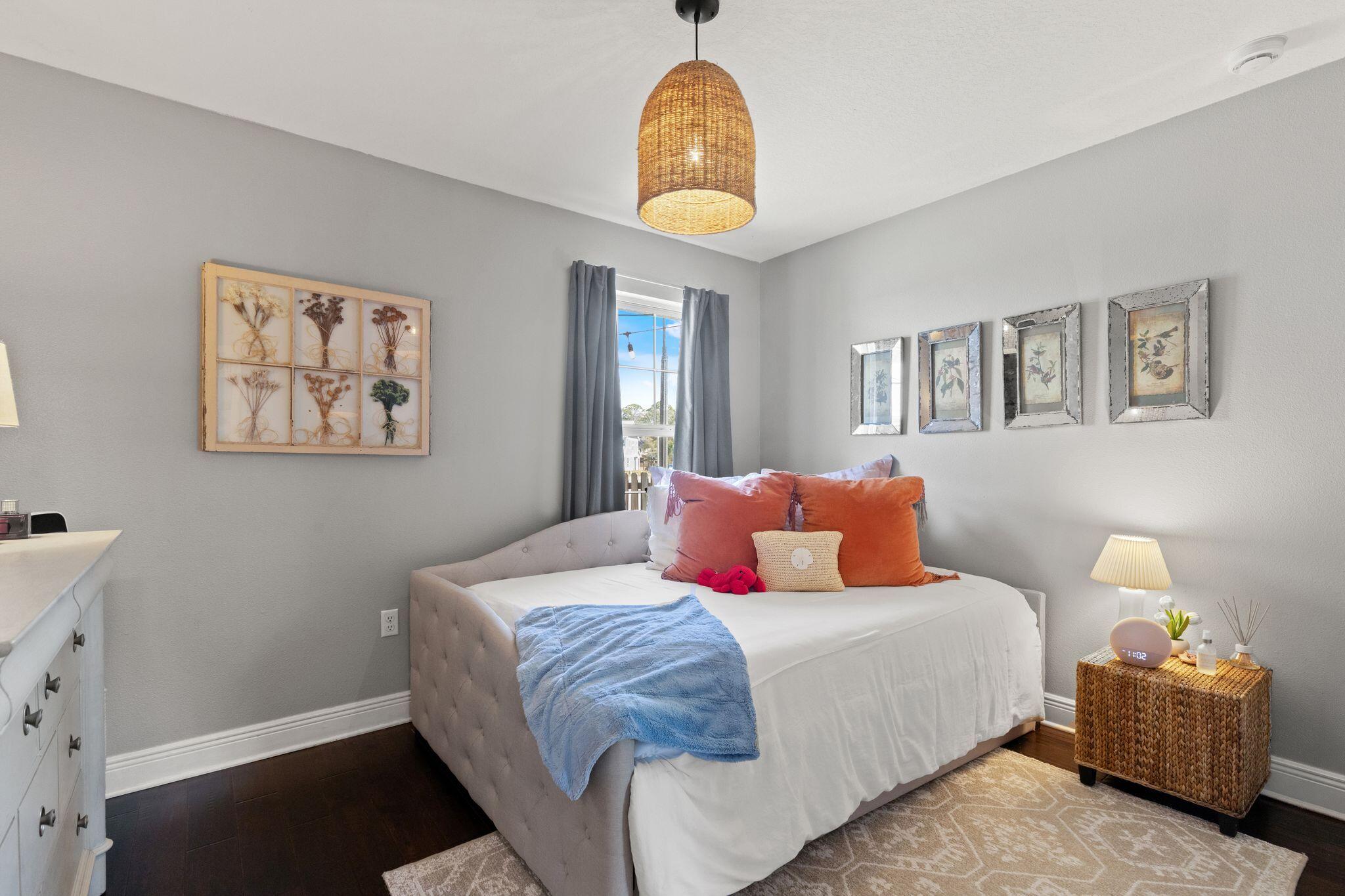 10 Golden Eagle Court Santa Rosa Beach, FL 32459 - Photo 25 of 36 a bedroom with a bed and a painting on the wall
