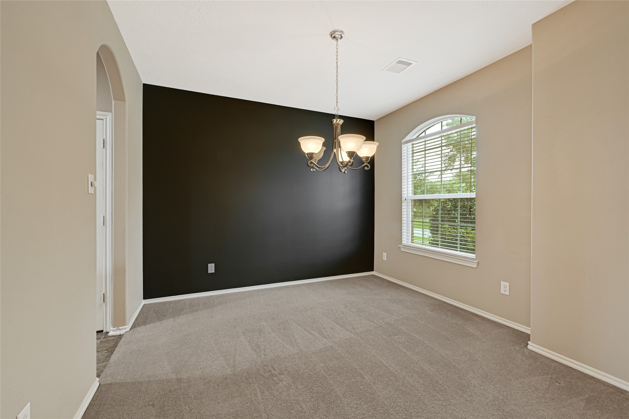 13610 Summer Spring Lane Rosharon, TX 77583 - Photo 6 of 25 Formal Dining Room with accent wall