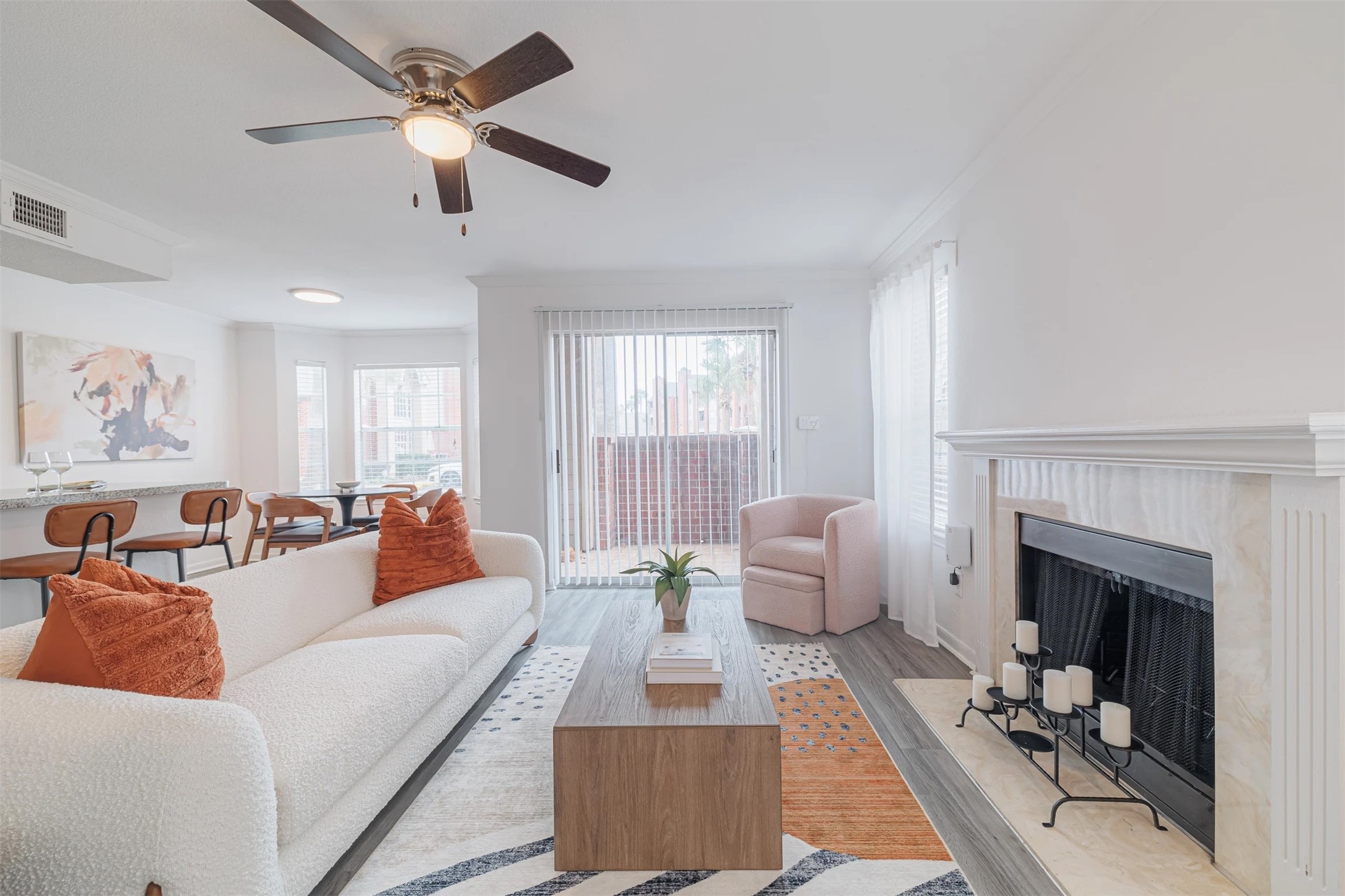 8300 El Mundo Street, Unit 192 Houston, TX 77054 - Photo 3 of 27 a living room with furniture and a fireplace