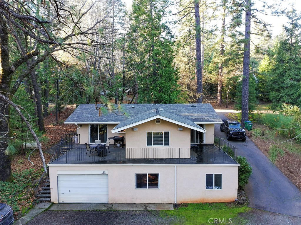 4728 Hartley Drive Forest Ranch, CA 95942 - Photo 2 of 33 a aerial view of a house with yard and trees in the background