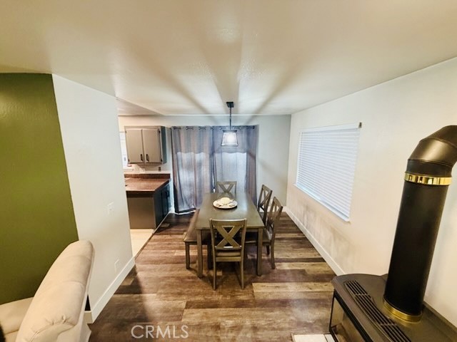 4728 Hartley Drive Forest Ranch, CA 95942 - Photo 6 of 33 a view of a dining room with furniture window and wooden floor