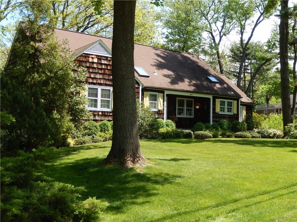 15 Paddock Road Rye Brook, NY 10573 - Photo 1 of 1 a front view of a house with a yard