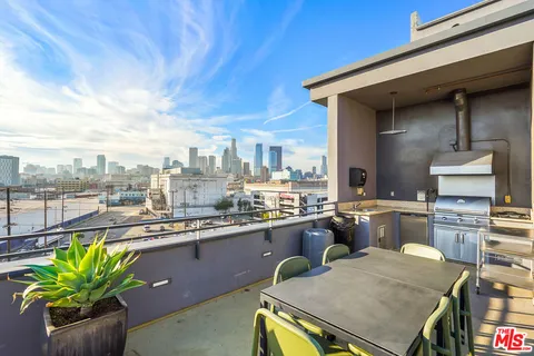 an aerial view of a building with parking space
