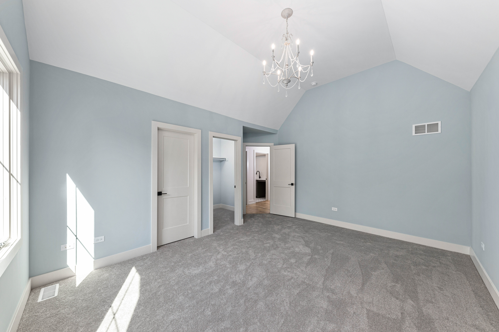 1314 Eagle Street Naperville, IL 60563 - Photo 18 of 28 a view of an empty room with chandelier and window