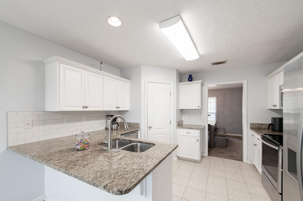 1473 Oxpens Road Warrenville, SC 29851 - Photo 5 of 25 Kitchen with Granite Counters!