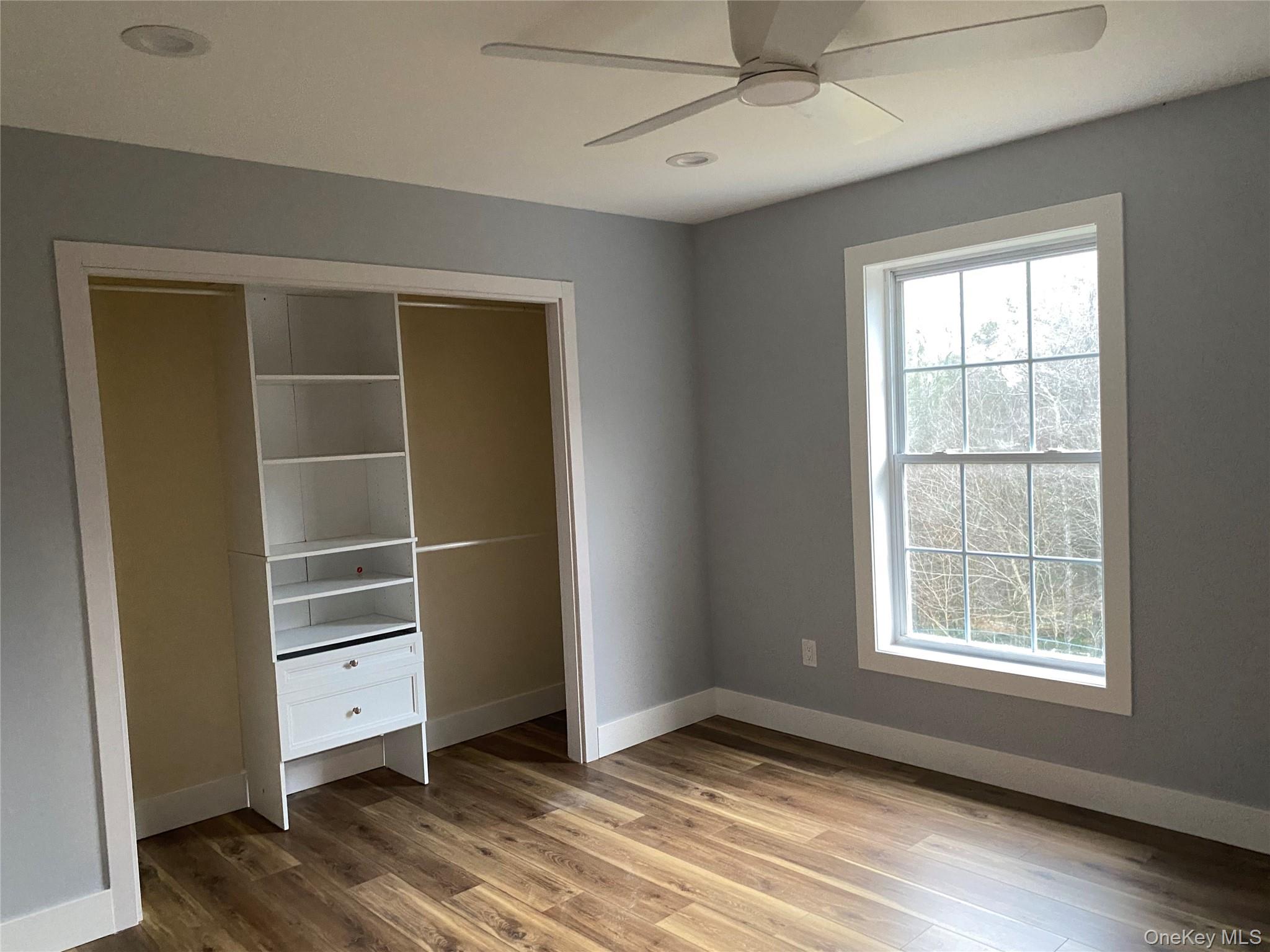 44 Roslyn Ridge Road Mongaup Valley, NY 12762 - Photo 18 of 24 Unfurnished bedroom with light wood finished floors, ceiling fan, recessed lighting, and a closet