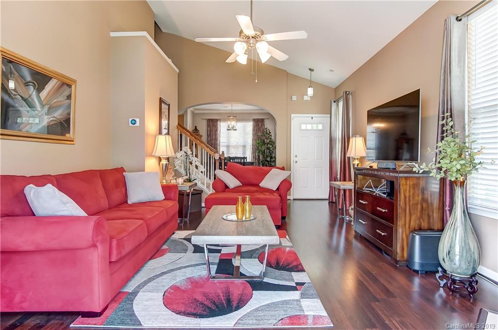 818 Gentlewinds Court Fort Mill, SC 29708 - Photo 5 of 22 a living room with furniture and a flat screen tv