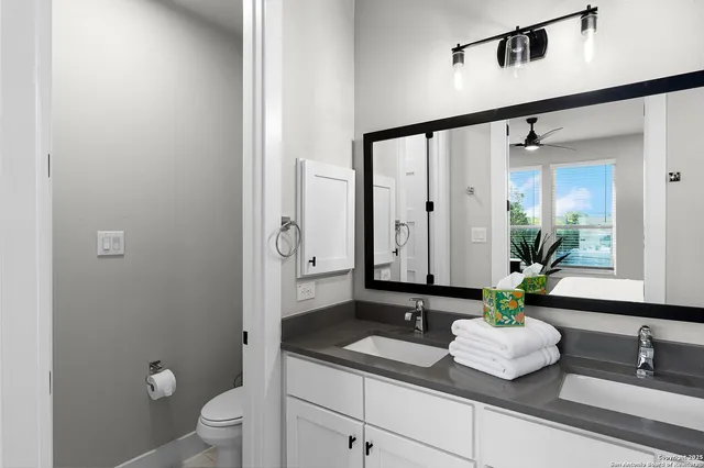 a view of a balcony with chairs