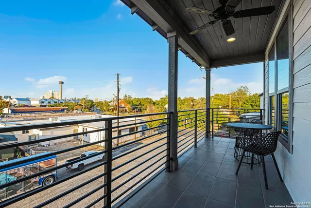 a kitchen with a table and chairs in it