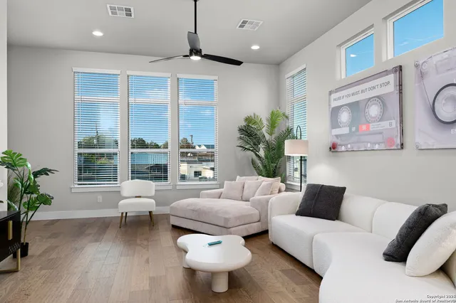 a bathroom with a sink vanity and toilet
