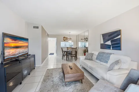 a living room with furniture and a couch