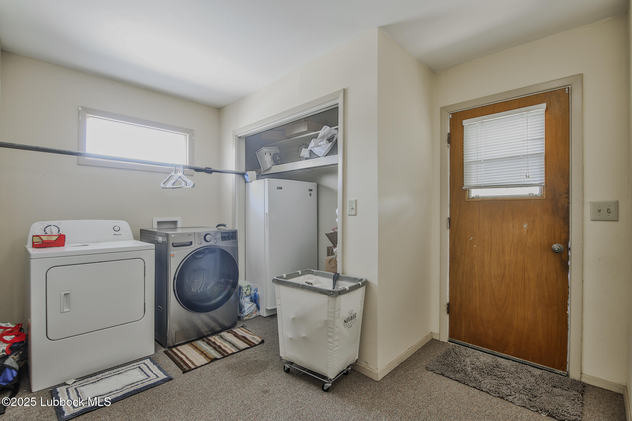 515 East 16th Street Littlefield, TX 79339 - Photo 26 of 32 a room with storage and utility