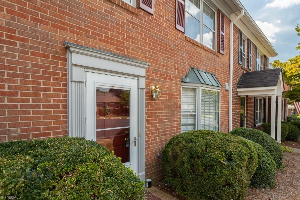 4843 Tower Road, Unit B Greensboro, NC 27410 - Photo 2 of 22 New storm door, lovely bay window and more greets you when entering this home.