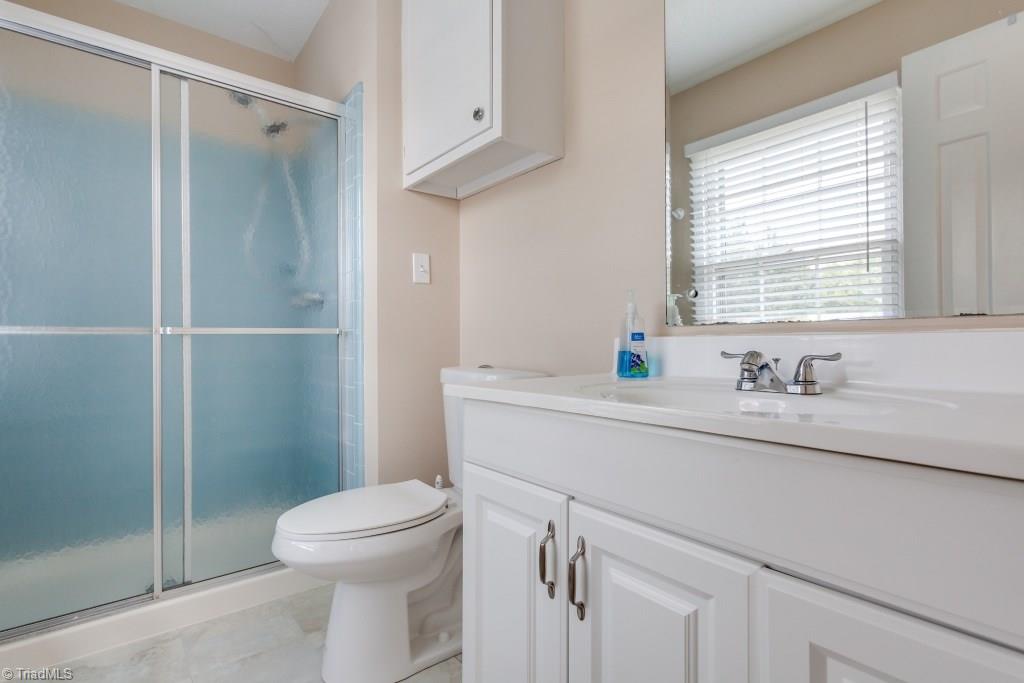 4843 Tower Road, Unit B Greensboro, NC 27410 - Photo 16 of 22 Master Bathroom w/fresh paint and newer fixtures.