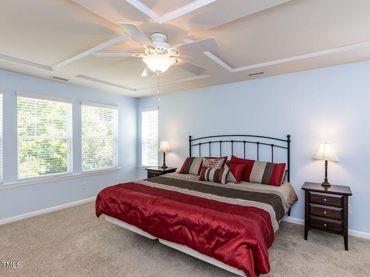 112 Victorian Oaks Drive Durham, NC 27713 - Photo 15 of 32 a bedroom with a large bed and a chandelier