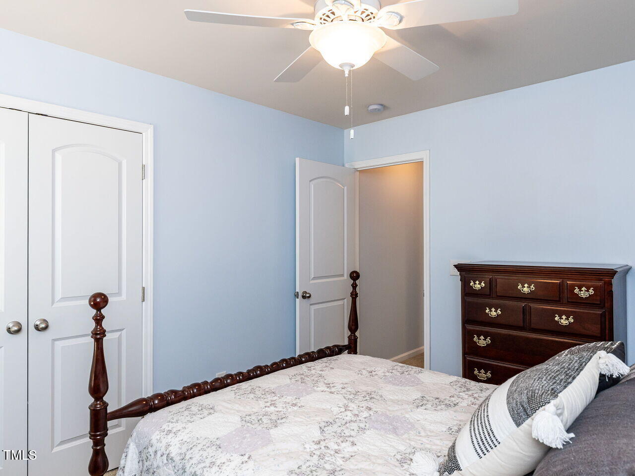 112 Victorian Oaks Drive Durham, NC 27713 - Photo 22 of 32 a bedroom with a bed and a dresser