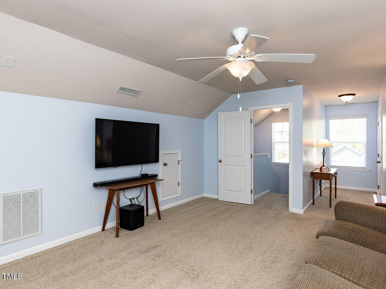 112 Victorian Oaks Drive Durham, NC 27713 - Photo 28 of 32 a view of a livingroom with a flat screen tv