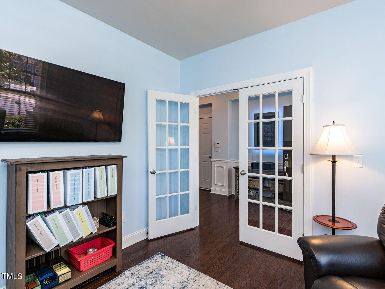 112 Victorian Oaks Drive Durham, NC 27713 - Photo 6 of 32 a living room with furniture and a flat screen tv