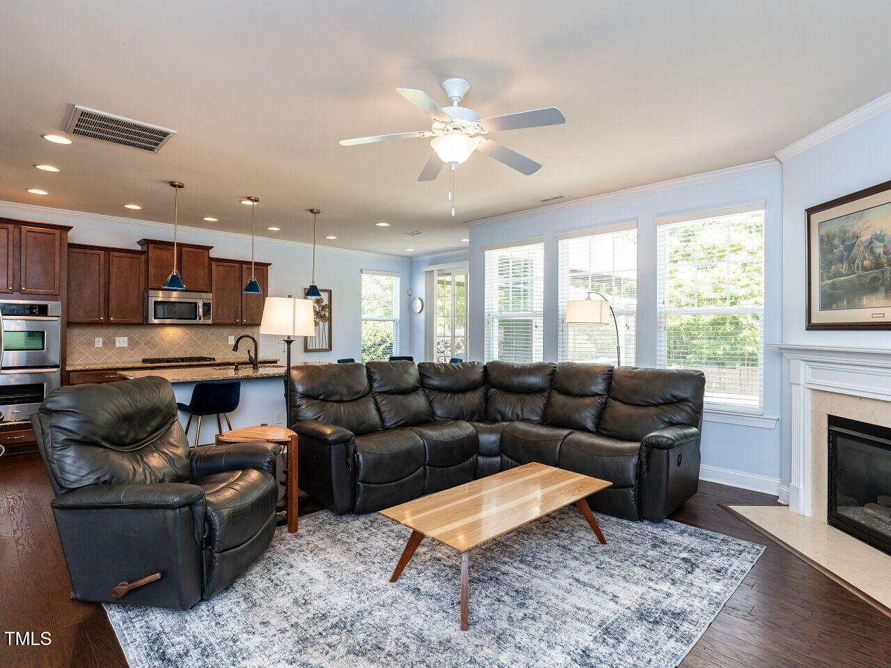 112 Victorian Oaks Drive Durham, NC 27713 - Photo 8 of 32 a living room with furniture and a fireplace