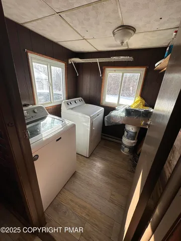 a utility room with dryer and washer