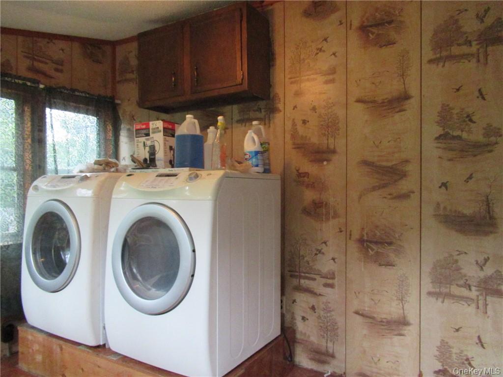 357 Mountain Lodge Road Monroe, NY 10950 - Photo 7 of 20 Clothes washing area with washer and clothes dryer and cabinets