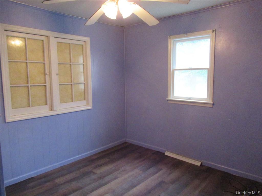 357 Mountain Lodge Road Monroe, NY 10950 - Photo 10 of 20 Unfurnished room with dark hardwood / wood-style floors and ceiling fan