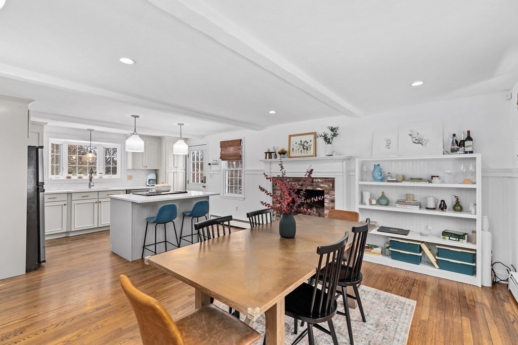 207 Tilden Road Scituate, MA 02066 - Photo 15 of 42 a view of a dining room with furniture and wooden floor