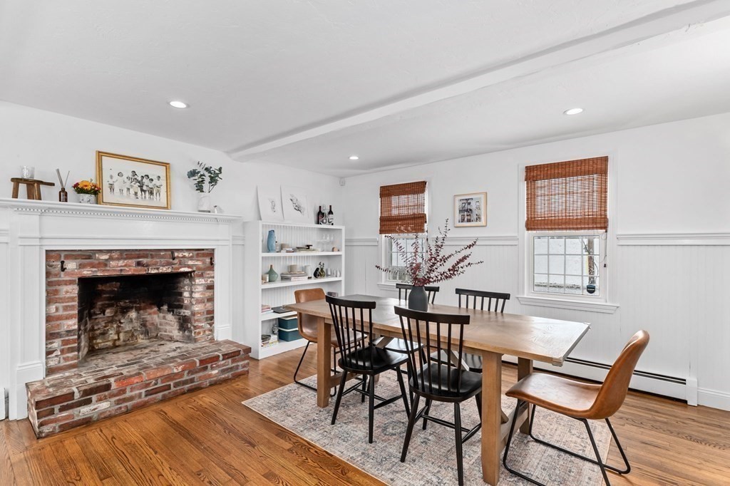 207 Tilden Road Scituate, MA 02066 - Photo 16 of 42 a view of a livingroom with furniture and a fireplace