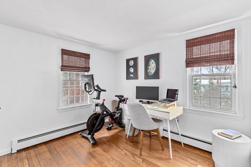 207 Tilden Road Scituate, MA 02066 - Photo 24 of 42 a view of a workspace with furniture and a window