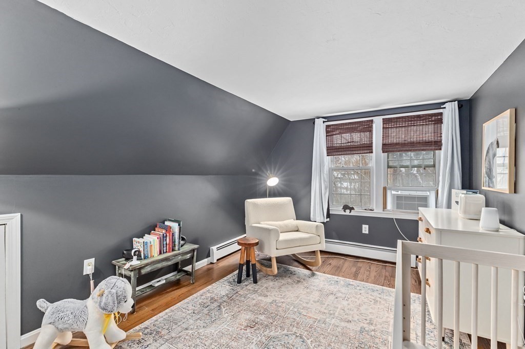 207 Tilden Road Scituate, MA 02066 - Photo 31 of 42 a living room with furniture and a large window