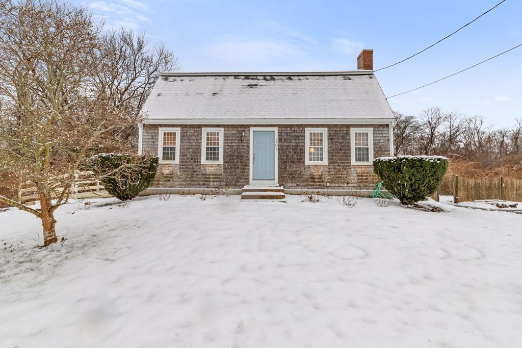207 Tilden Road Scituate, MA 02066 - Photo 33 of 42 front view of a house with a yard