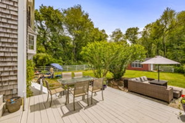 207 Tilden Road Scituate, MA 02066 - Photo 36 of 42 a view of a swimming pool with a patio