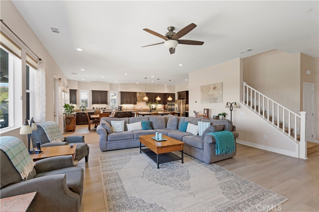13500 Gold Medal Court Riverside, CA 92503 - Photo 16 of 48 a living room with furniture and a view of kitchen