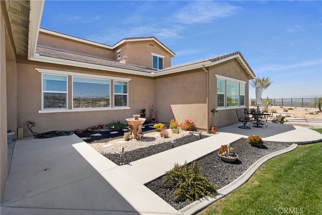 13500 Gold Medal Court Riverside, CA 92503 - Photo 44 of 48 a view of a house with backyard water fountain and sitting area