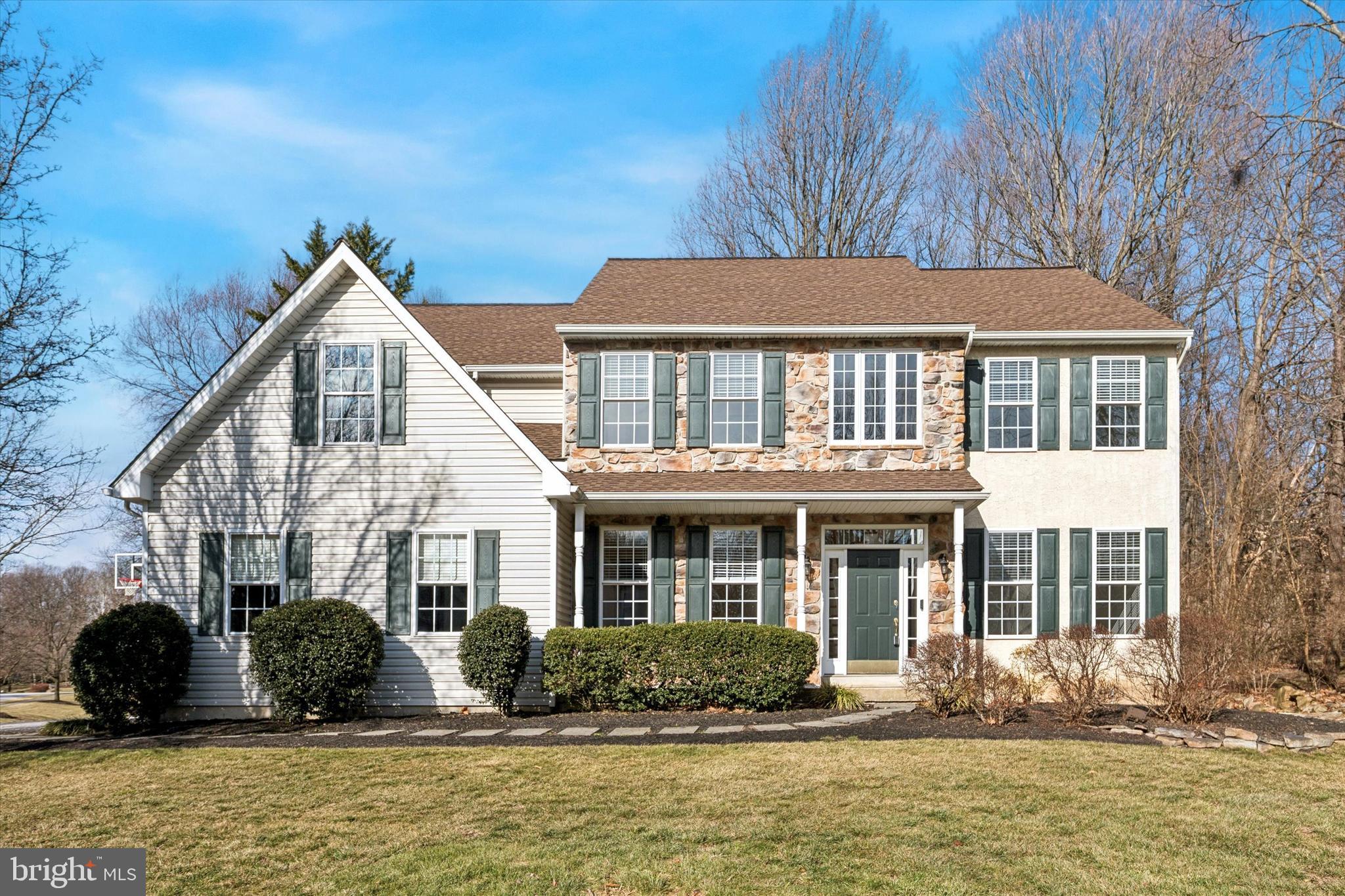913 Grandview Drive Exton, PA 19341 - Photo 1 of 1 a front view of a house with garden