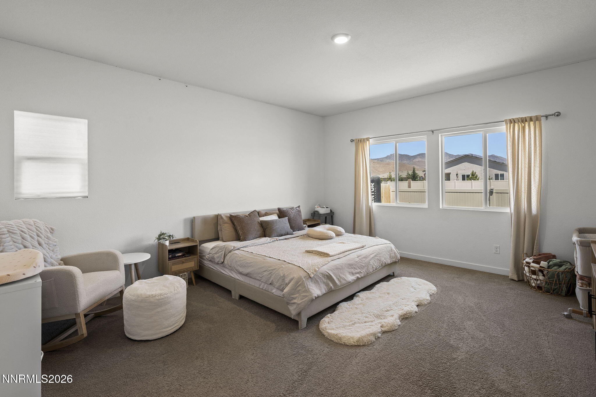 738 Butte Creek Road Dayton, NV 89403 - Photo 12 of 28 a bedroom with bed and window