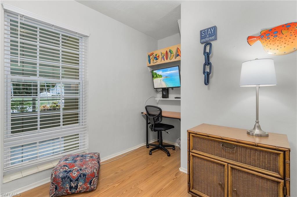 1281 10th Street North Naples, FL 34102 - Photo 16 of 31 Office area with light wood finished floors and baseboards