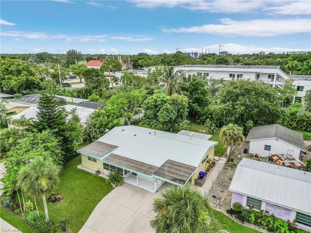 1281 10th Street North Naples, FL 34102 - Photo 24 of 31 Aerial view of a tree filled landscape