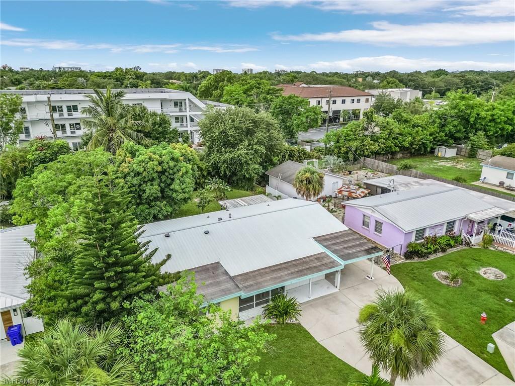 1281 10th Street North Naples, FL 34102 - Photo 26 of 31 Drone / aerial view of a tree filled landscape